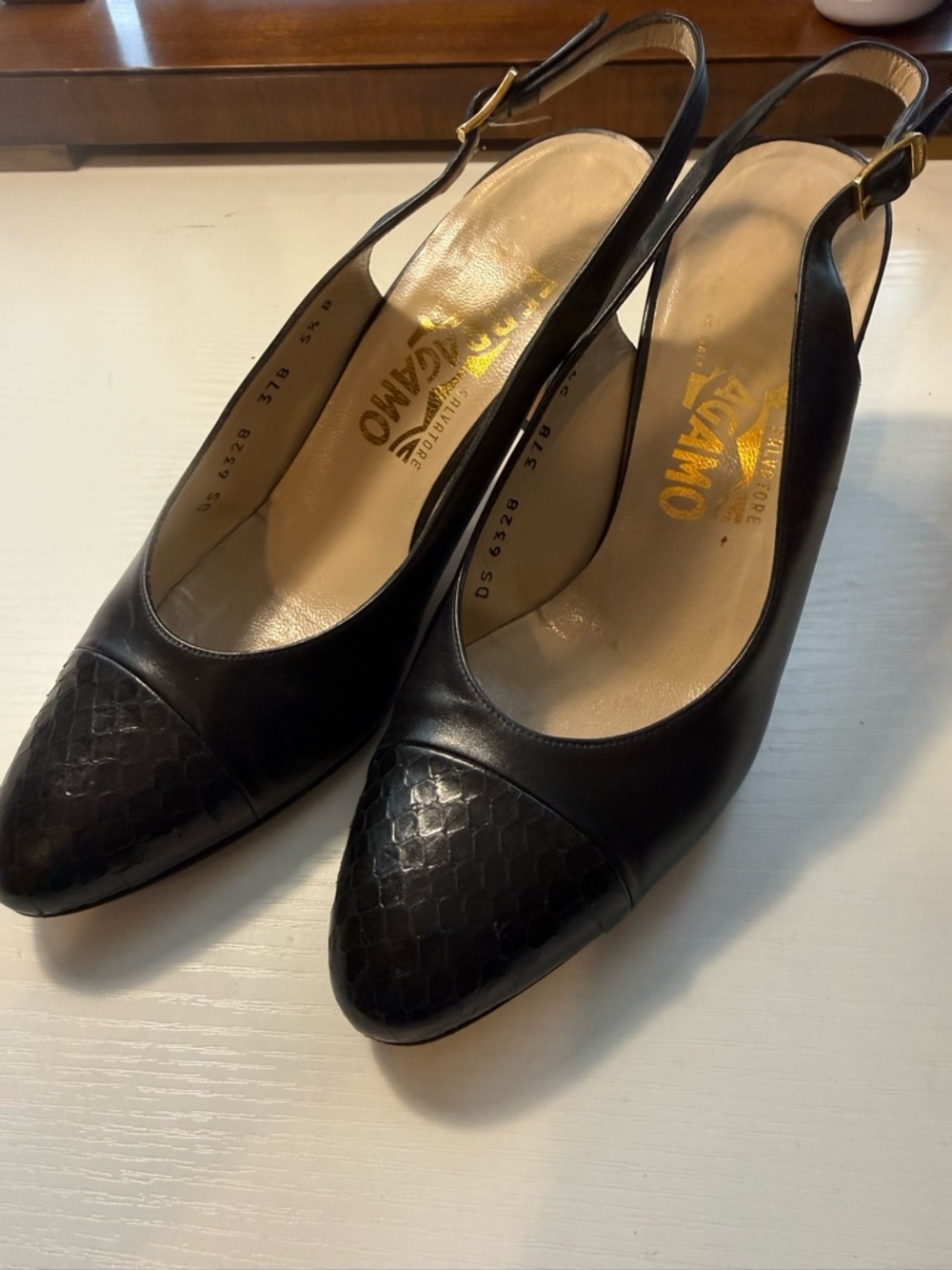 Salvatore Ferragamo Black Leather Slingback Pumps with Textured Cap Toe